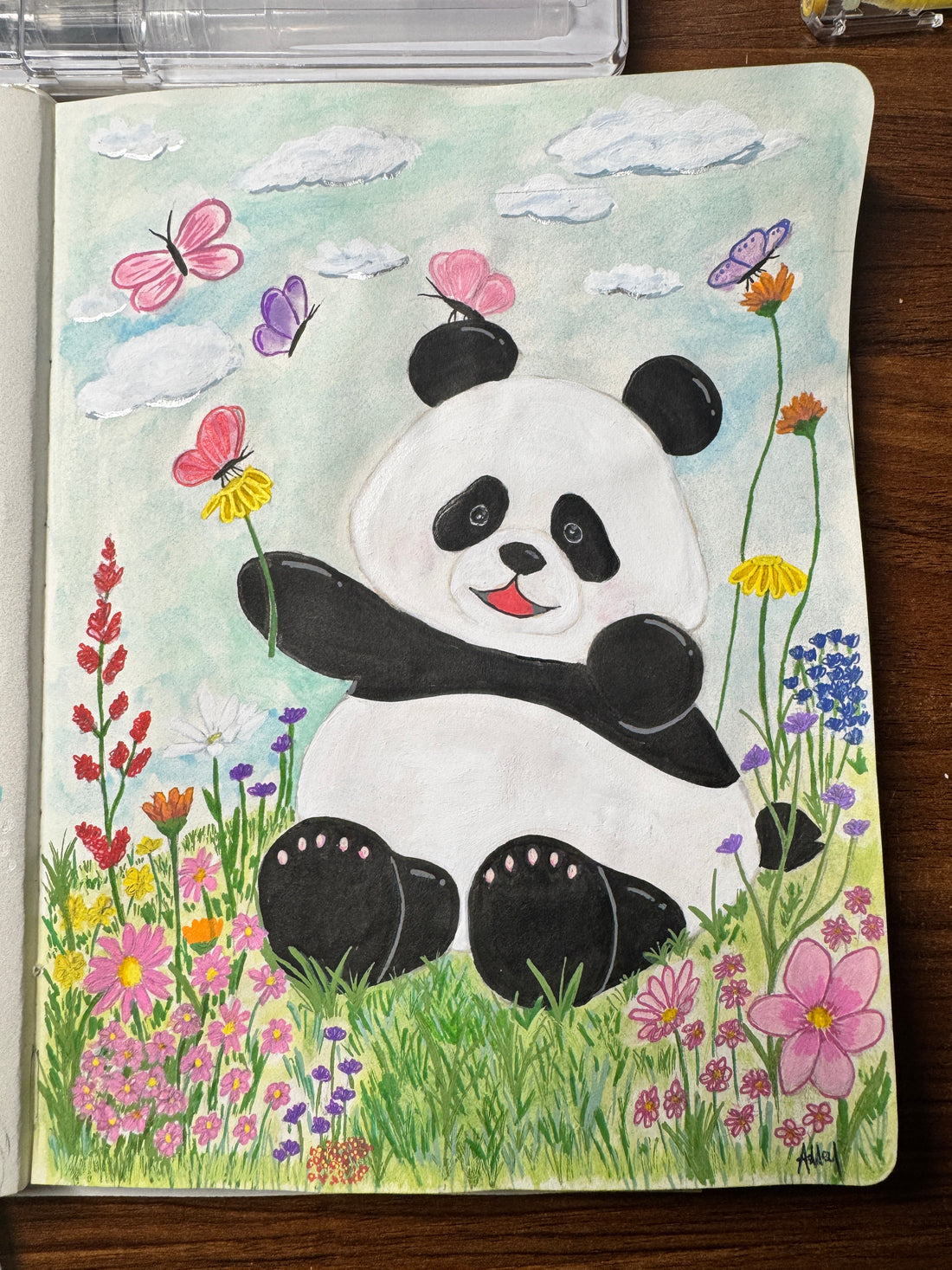 Mixed media painting of mochi the panda sitting a meadow of wild flowers and butterflies 