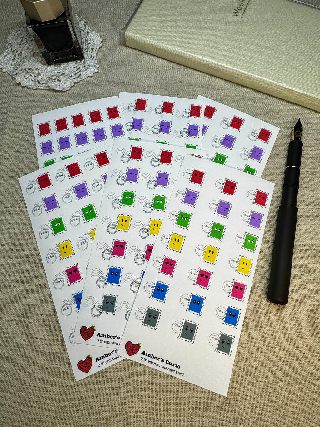 Sticker sheets of emotion doodle icons shaped as stamps printed on premium matte sticker paper
