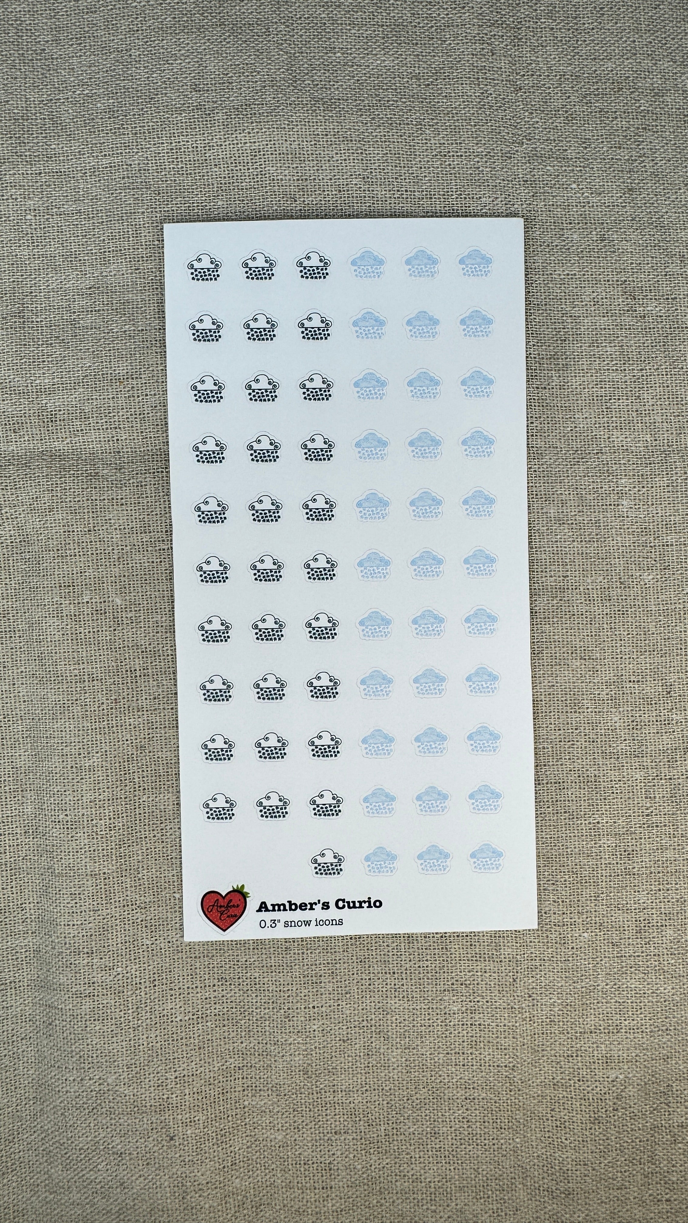Sticker sheet of decorative weather snow icons printed on premium matte sticker paper
