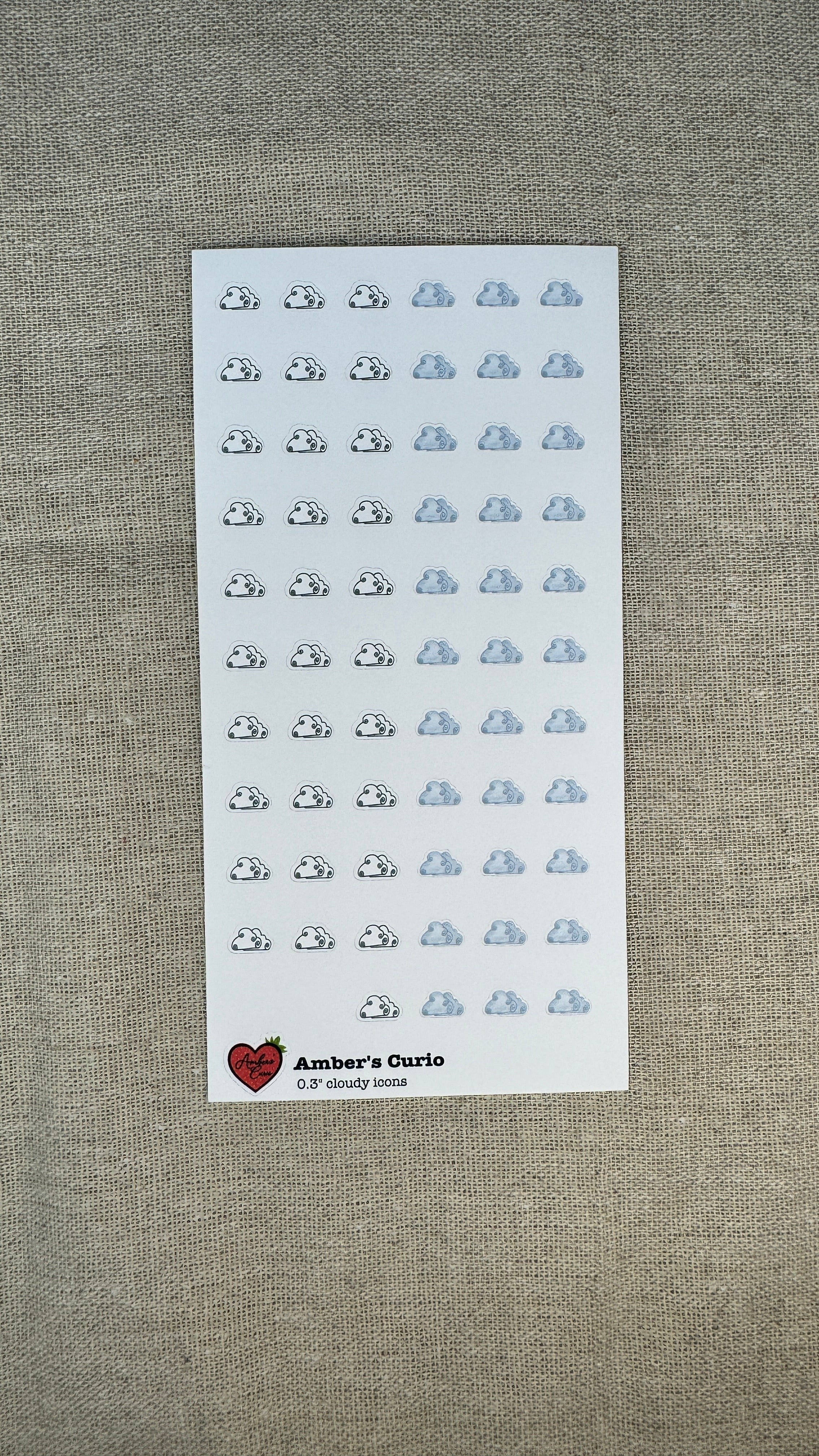 Sticker sheets of decorative weather cloudy icons printed on premium matte sticker paper