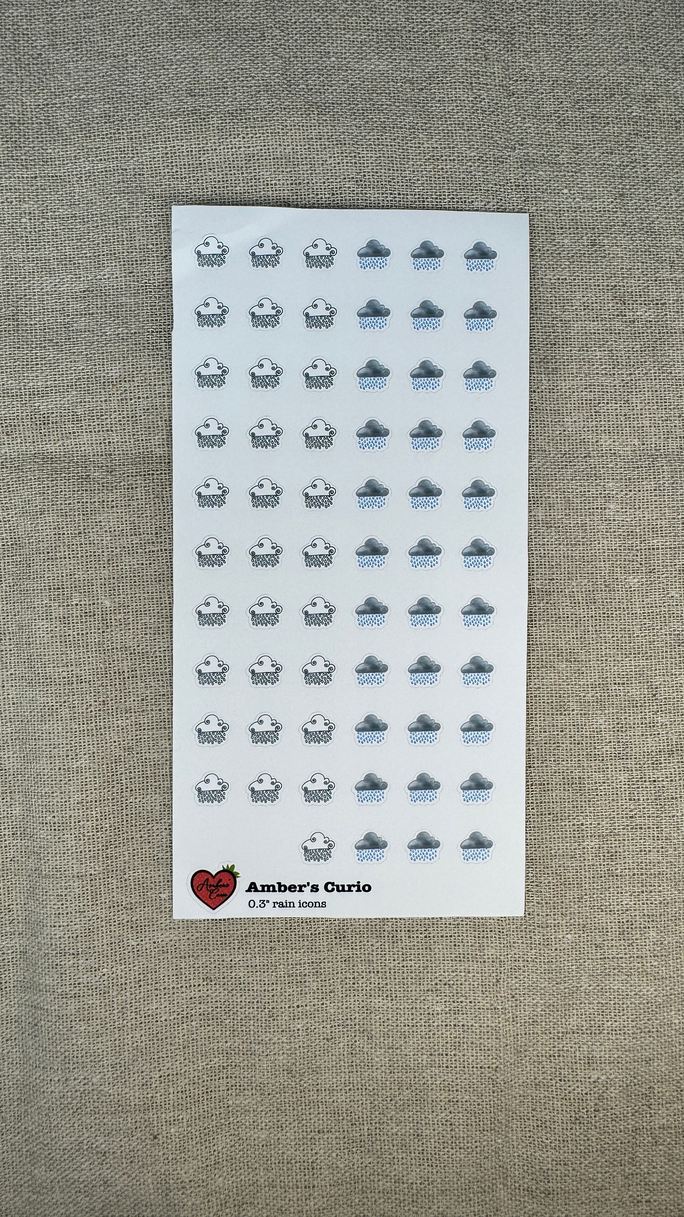 Sticker sheets of decorative weather rain icons printed on premium matte sticker paper