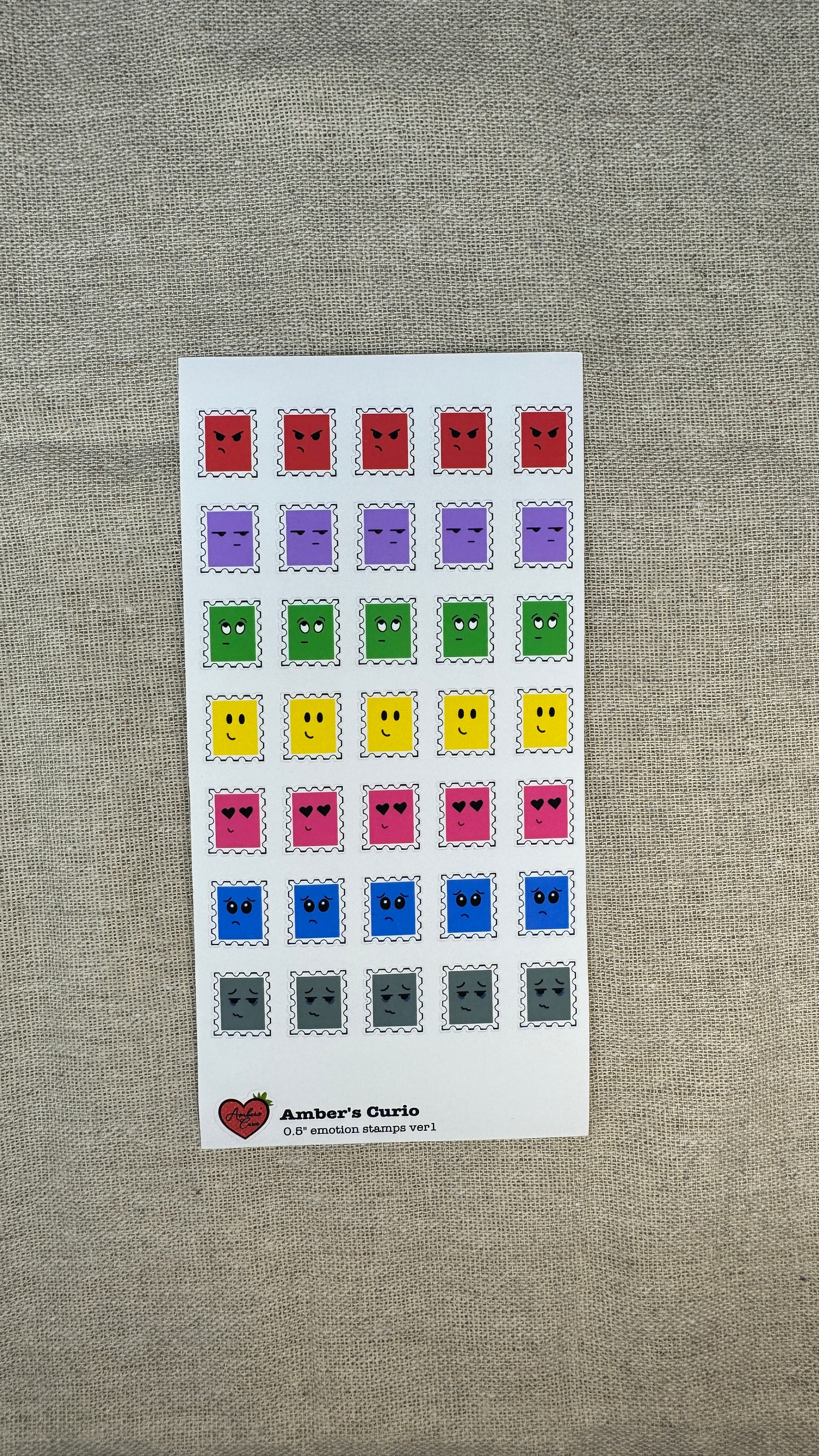 Sticker sheets of emotion doodle icons shaped as stamps printed on premium matte sticker paper